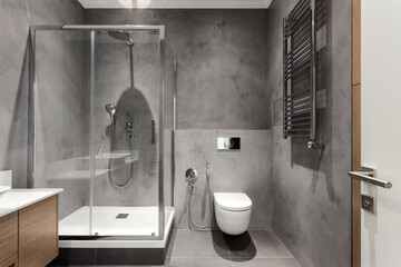 bathroom with grey tones and luxury design at apartment