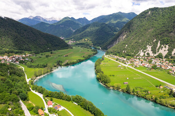 Canvas Print - Aerial drone view of Most na Soci town in Slovenia and Soca river