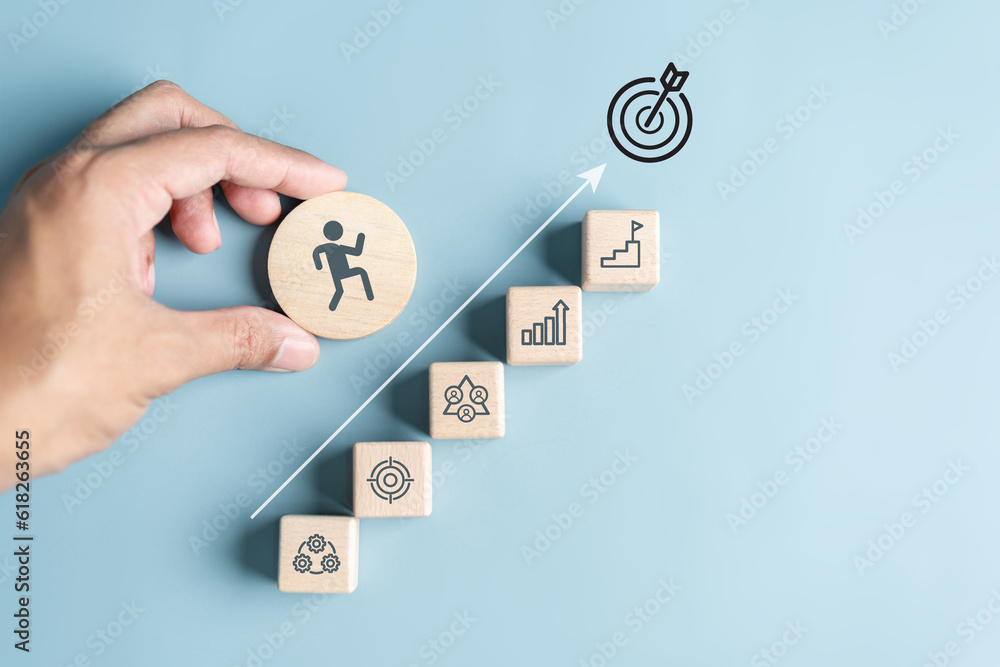 Business growth success achievement concept, hand arranging wooden ...