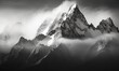  a black and white photo of a mountain range covered in fog and clouds with a black and white photo of the top of the mountain in the foreground.  generative ai