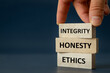 integrity honesty ethics, Ethics and honesty in life and business, hand arranging wooden blocks with the text 