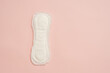 Feminine sanitary napkin (sanitary pad) on pink background