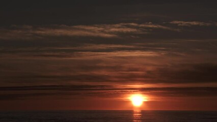 Wall Mural - Last Light Sunset Over Ocean Time Lapse