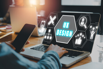 Wall Mural - ux developer and ui designer concept, person working on laptop computer with ux design icon on virtu