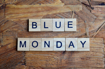 blue monday text on wooden square, business motivation quotes