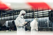 © kanpisut - Scientist wear Chemical protection suit check danger chemical, working at dangerous zone in Red and White Lines of barrier tape. Red and white Hazardous restricted area factory safety worker industry