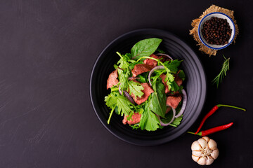 Canvas Print - Beef salad with green vegetables Grilled beef salad Thai food Healthy beef salad menu with pepper, garlic, spices Lunch Dinner