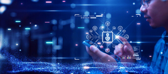 Fototapete - Young man accessing app or login to website on Internet to conduct transactions via smartphone. Digital technology concept of Cybersecurity Protect personal databases from online crime.