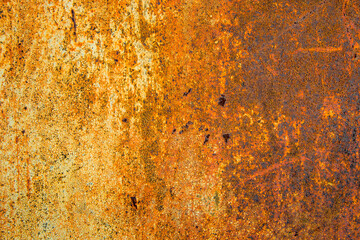 Old cracked paint in craquelure on a rusty metal surfaceGrunge rusted metal texture. Rusty corrosion and oxidized background. Worn metallic iron rusty metal background.