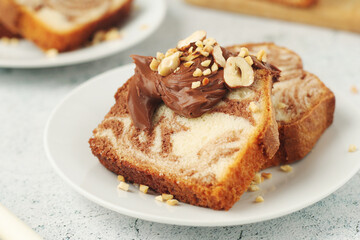 Wall Mural - A piece of marble biscuit with chocolate cream and nuts