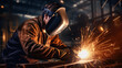 © Abzal - A young man welder in brown uniform, welding mask and welders leathers, weld metal with a arc welding machine at the construction site, blue sparks fly to the sides