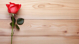 Fototapeta Kwiaty - Red Rose on the Wooden Textured Background