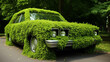 Car recovered with green plants , greenwashing concept