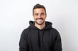 © igolaizola - Portrait of a smiling man in a black hoodie on a white background