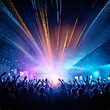 © Usman - Photo of a lively concert crowd with hands raised in the air