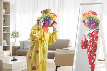 Poster - Clown looking at another clowin in a mirror reflection