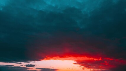 Wall Mural - Morning Sunrise. Sunlight Shining Through Clouds. Cumulus Sky Time-lapse 4k. Clouds Move Quickly Across The Sky. Flight Of Fancy. Sunrays, Sunray, Ray, Dramatic Sky. Sunrise Sky Natural Background