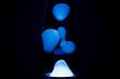 Close Up blue Lava Lamp, black background, horizontal format with copy space