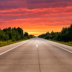 Sticker - Empty highway in countryside at sunset