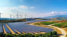 Solar Power Plant, Panorama View Of Environmentally Friendly Installation Of Photovoltaic Power Plant And Wind Turbine Farm Situated By Landfill.