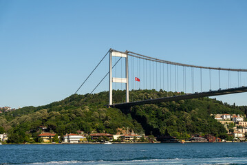 Fatih Sultan Mehmet Bridge and Turkish Flag on the Bosphorus. Istanbul, Turkey. (Fatih Korosu, Fatih Sultan Mehmet Köprüsü)