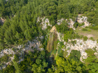 Wall Mural - King Pool, a view from top of the Ucansu waterfall cliff to the green forest in Antalya - Turkey