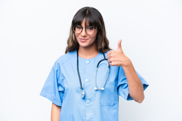 Wall Mural - Young caucasian nurse woman isolated on white background with thumbs up because something good has happened