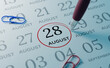 © temitiman - August 28th Calendar date. close up a red circle is drawn on August 28th to remember important events