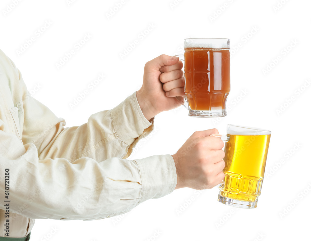 Young man with beer on white background. Octoberfest celebration
