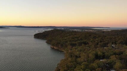 Sticker - Lake Macquarie lakeshore aerial timelapse flying over Murrays beach as 4k.
