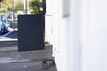 Poster - Blank sign standing on pavement with copy space