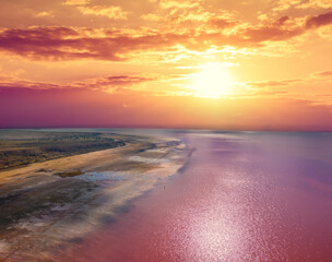 Wall Mural - Landscape with lake and cloudy sky. Panoramic view from above at Pink lake