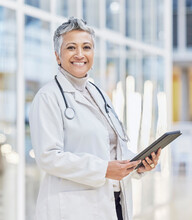 Portrait Of Doctor, Woman And Tablet For Medical Review, Data Research And Healthcare In Hospital. Happy Female Physician, Digital Technology And Planning Telehealth Network, Connection Or Online App