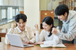 © TEAM PRE-LIGHT - Two young college student man and woman couple model and solo male model looking at laptop and book together in library of Asian Korean university