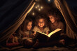 Kids read a fairytale book before going to bed in a homemade cozy tent at home