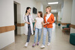 © Viacheslav Yakobchuk - Therapist following with woman and her daughter to examination room