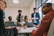 © qunica.com - Group of business people working together