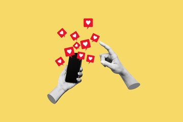 female hand pointing to like symbols of social networks from mobile phone with black screen on yello