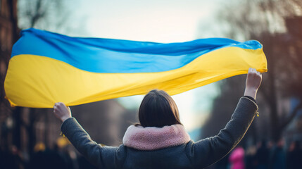 Ukraine flag held by person during protest