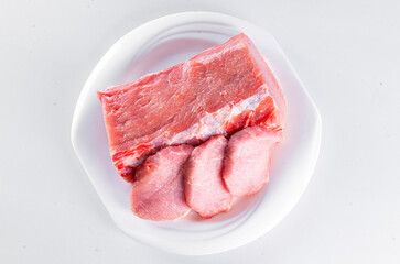 Fresh pork on a white table