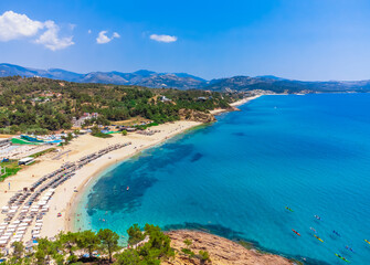 Wall Mural - Beach and turquoise sea, umbrellas. Trypiti Beach, Thassos, Greece