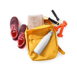 Wall Mural - Backpack with sports equipment on white background, top view