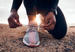 © Mumtaaz Dharsey/peopleimages.com - Shoes, fitness and person typing laces ready for outdoor exercise, workout or hiking for health and wellness. Hands, closeup and athlete or runner prepare for marathon training or endurance running