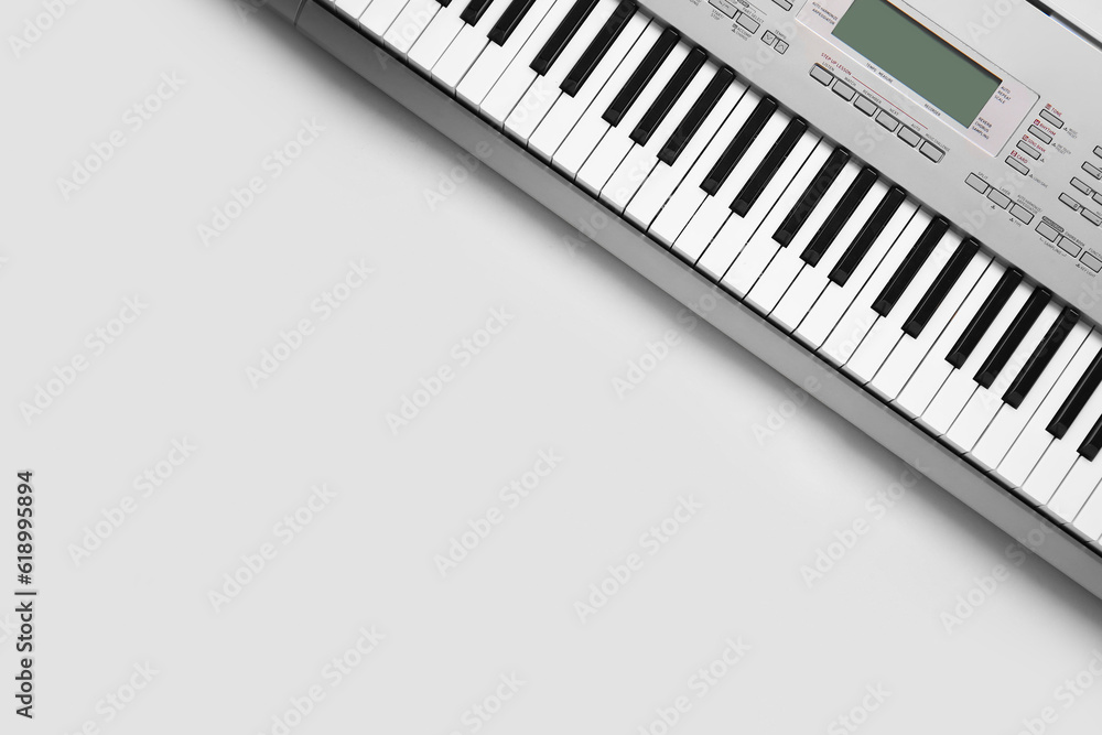 Modern synthesizer keyboard on white background