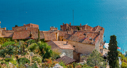 Sticker - Scenic view of the Mediterranean coastline and medieval houses from the top of the town of Eze village on the French Riviera