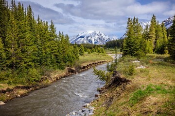 Sticker - Scenic view of a river winding through a mountainous landscape