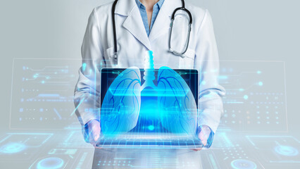 Fototapete - Cropped of woman doctor showing laptop, hologram of human lungs