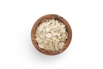 Wall Mural - A top view of oat flakes in a wood bowl on white background