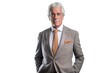 © VK Studio - Elderly businessman in suit got hands in pockets looking at camera on white backdrop. Generative AI