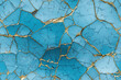 Nahtloses Muster - Wiederholende Textur von abstrakter blau goldener rauer Oberfläche